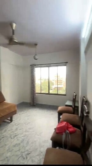 Living Room in 2 BHK Apartment at New Gokul Plaza CHS, Kandivali East – for Rent