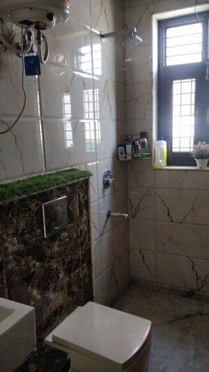 Bathroom in 3 BHK Apartment at Viman Cooperative Housing Society, Sector 9a – for Sale