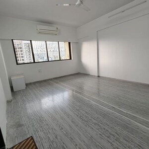 Living Room in 2 BHK Apartment at Golden Square, Santacruz East – for Rent