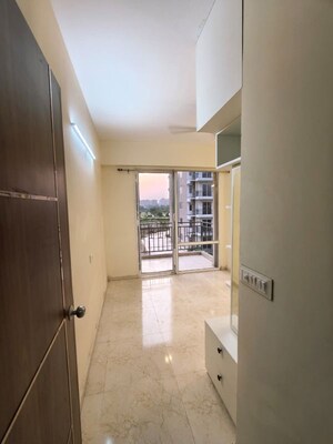 Building Lobby in 2 BHK Apartment at MRG Ultimus, Sector 90 – for Rent