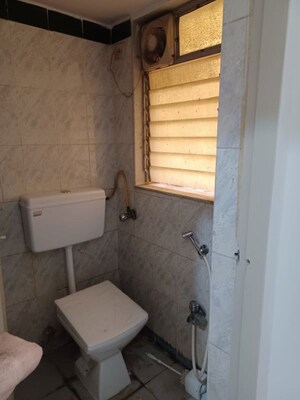 Bathroom in 2 BHK Apartment at Dheeraj Valley, Goregaon East – for Rent