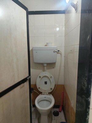 Bathroom in 1 BHK Apartment at Tilak Nagar – for Rent