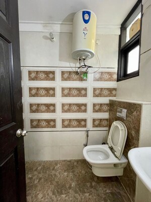 Bathroom in 3 BHK Apartment at Dhakoli – for Sale