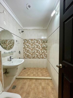 Bathroom in 3 BHK Apartment at Dhakoli – for Sale