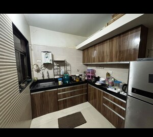 Kitchen in 2 BHK Apartment at Cosmos Jewels Ruby, Ghodbunder Road – for Rent