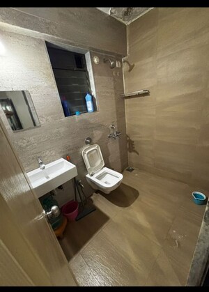 Bathroom in 2 BHK Apartment at Cosmos Jewels Ruby, Ghodbunder Road – for Rent