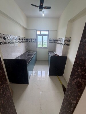 Team Area in 1 BHK Apartment at Vedant Sumeet Elite, Balkum Pada – for Rent