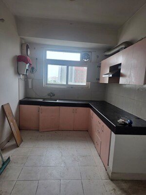 Kitchen in 3.5 BHK Apartment at Ansals Celebrity Greens, Sushant Golf City – for Sale