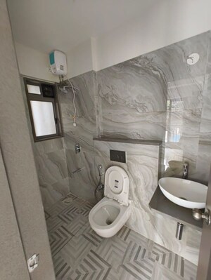 Bathroom in 1 BHK Apartment at Transcon Triumph Tower, Andheri West – for Rent