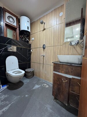 Bathroom in 1 BHK Apartment at Palm Residency Chhatarpur, Chattarpur – for Rent