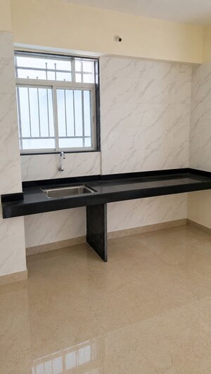Kitchen in 2 BHK Apartment at Bunty Mayur Kilbil, Dhanori – for Rent