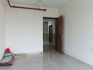 Room in 2 BHK Apartment at Sheth Irene, Malad West – for Rent