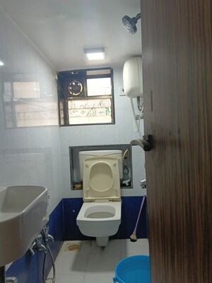 Bathroom in 2 BHK Apartment at Romell Diva, Malad West – for Rent