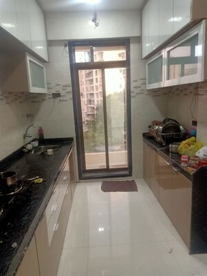 Kitchen in 2 BHK Apartment at Madhav Sansar, Kalyan West – for Sale