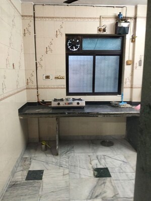 Kitchen in 2 BHK Apartment at Madhav Sansar, Kalyan West – for Sale