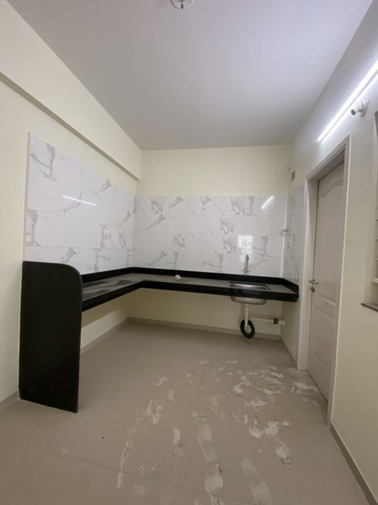 Kitchen, kumar-pinakin 2 Bedroom 1000 Sq.Ft. Apartment In Baner Pune 10596695