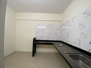 Kitchen in 2 BHK Apartment at Kumar Pinakin, Baner – for Rent