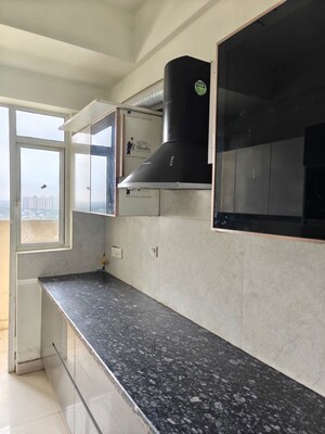 Kitchen in 3 BHK Apartment at ABA Coco County, Sector 10 Greater Noida – for Sale