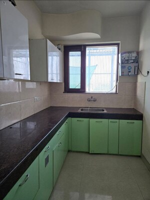 Kitchen in 3 BHK Apartment at The Surya Apartments CGHS, Sushant Lok ii – for Sale