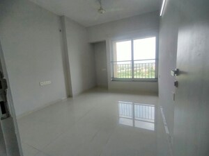 Room in 2 BHK Apartment at Rustomjee Urbania Azziano, Thane West – for Rent
