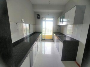 Kitchen in 2 BHK Apartment at Rustomjee Urbania Azziano, Thane West – for Rent