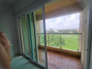 Room in 2 BHK Apartment at Rustomjee Urbania Azziano, Thane West – for Rent