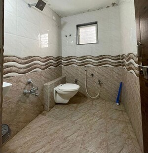 Bathroom in 2 BHK Apartment at Makarba – for Rent