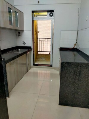 Kitchen in 2 BHK Apartment at Rustomjee Urbania Azziano, Thane West – for Rent