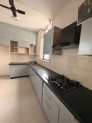Kitchen in 3 BHK Apartment at Piramal Vaikunth, Balkum Pada – for Rent