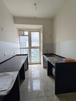 Kitchen in 2 BHK Apartment at Tata Serein, Pokhran Road No Two – for Rent