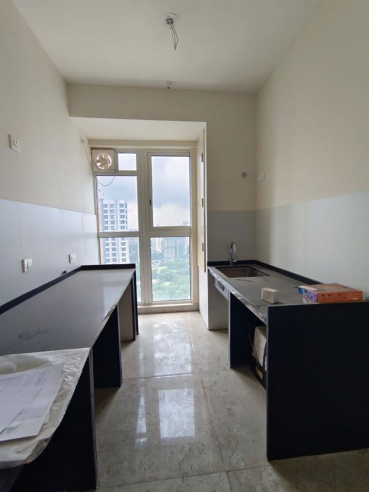 Kitchen, tata-serein 2 Bedroom 680 Sq.Ft. Apartment In Pokhran Road No Two Thane 10686942