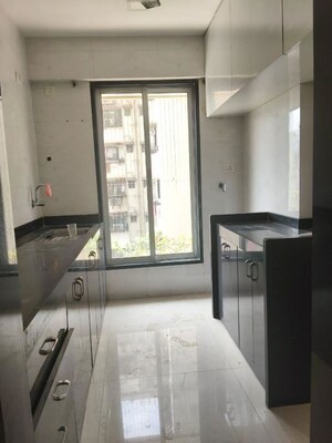 Kitchen in 2 BHK Apartment at Karmvir Avant Sky Villa, Goregaon East – for Rent