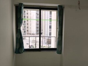 Room in 2 BHK Apartment at Sun Footprints, Shela – for Rent