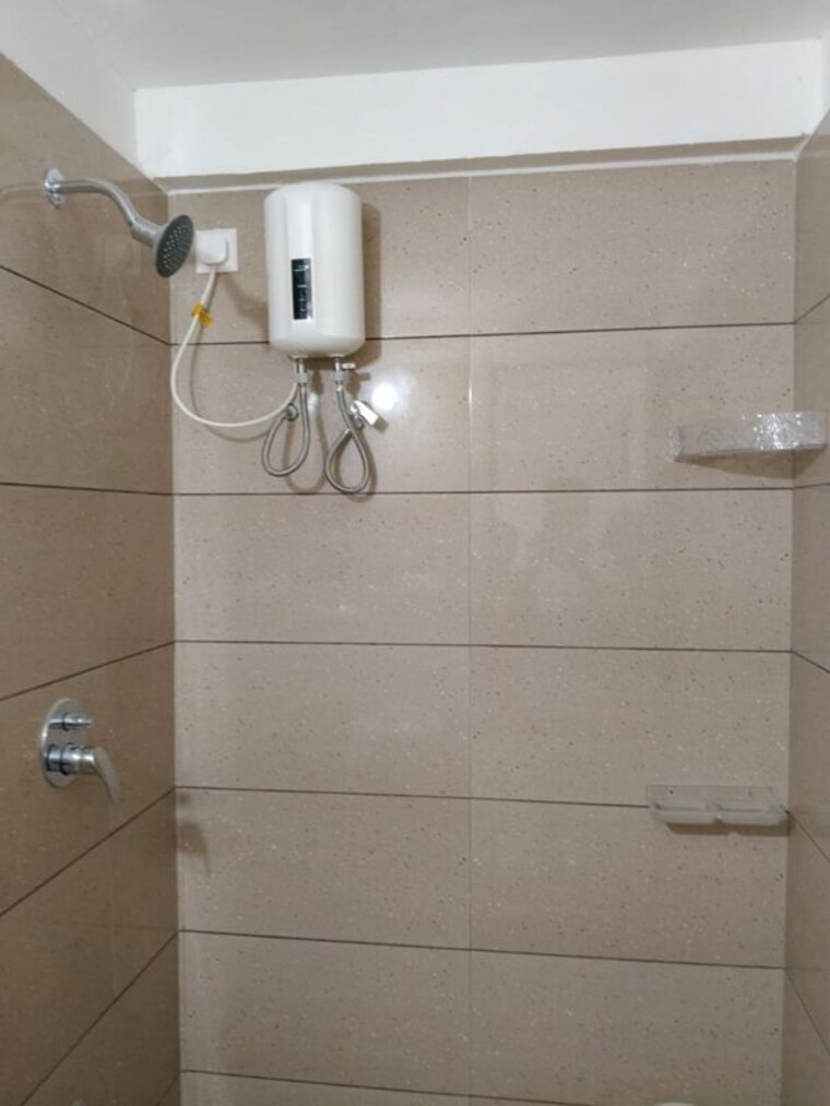 Bathroom, sun-footprints 2 Bedroom 671 Sq.Ft. Apartment In Shela Ahmedabad 10687026