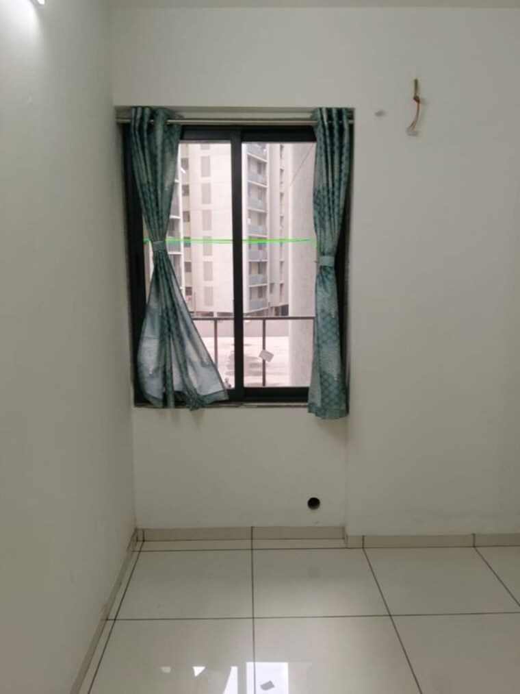 Room, sun-footprints 2 Bedroom 671 Sq.Ft. Apartment In Shela Ahmedabad 10687026