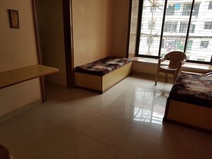 Living Room in 2 BHK Apartment at Natraj Building, Mulund West – for Rent