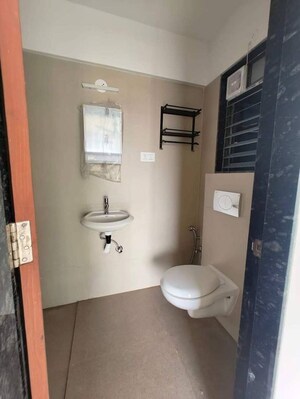 Bathroom in 2 BHK Apartment at Je And Vee Om Trimurti, Malad East – for Rent