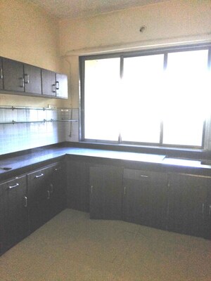 Kitchen in 3 BHK Apartment at Nirmal Lifestyle Residency CHS Ltd, Mulund West – for Rent