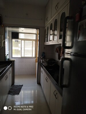 Kitchen in 1 BHK Apartment at Priyamvada CHS, Mulund West – for Rent
