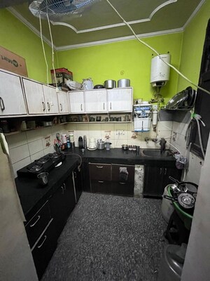 Kitchen in 2 BHK Builder Floor at Ashoka Enclave 3, Sector 35 – for Sale