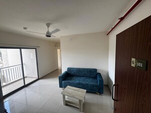 Living Room in 2 BHK Apartment at Glorious Tathastu, Ravet – for Rent