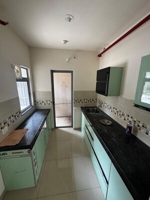 Kitchen in 2 BHK Apartment at Glorious Tathastu, Ravet – for Rent
