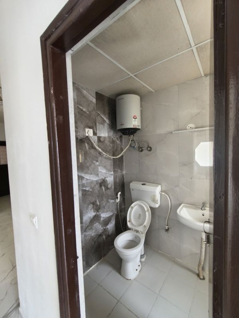 Bathroom, pivotal-riddhi-siddhi 2 Bedroom 600 Sq.Ft. Apartment In Sector 99 Gurgaon 10687386