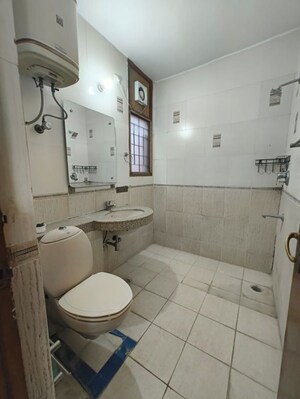 Bathroom in 3 BHK Apartment at CGHS Progressive Apartments, Sector 55 – for Rent
