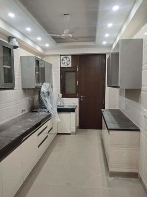 Kitchen in 3 BHK Builder Floor at Sushant Lok I – for Sale