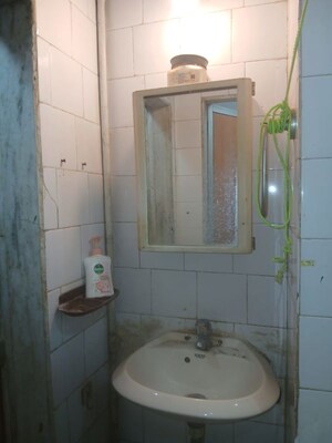 Bathroom in 1 BHK Apartment at Vasant Valley Complex, Malad East – for Rent