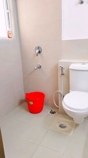 Bathroom in 2 BHK Apartment at Mahagun Moderne, Sector 78 – for Sale