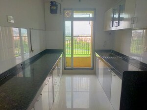 Kitchen in 2 BHK Apartment at Rustomjee Urbania Azziano, Thane West – for Rent
