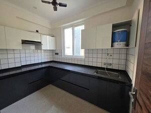 Kitchen in 2 BHK Builder Floor at Sharma Colony – for Rent