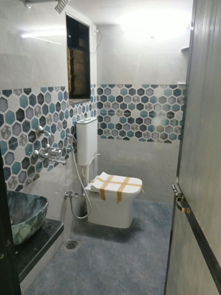 Washroom, pushkraj-apartments 1 Bedroom 563 Sq.Ft. Apartment In Goregaon East Mumbai 10687488